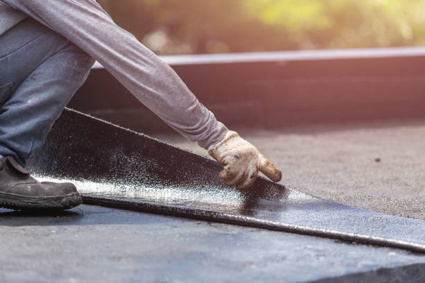 Professional Waterproofing technician working in Williston Park, NY